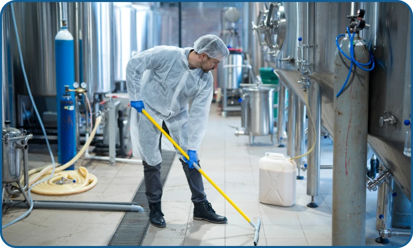 Person mopping in a brewery